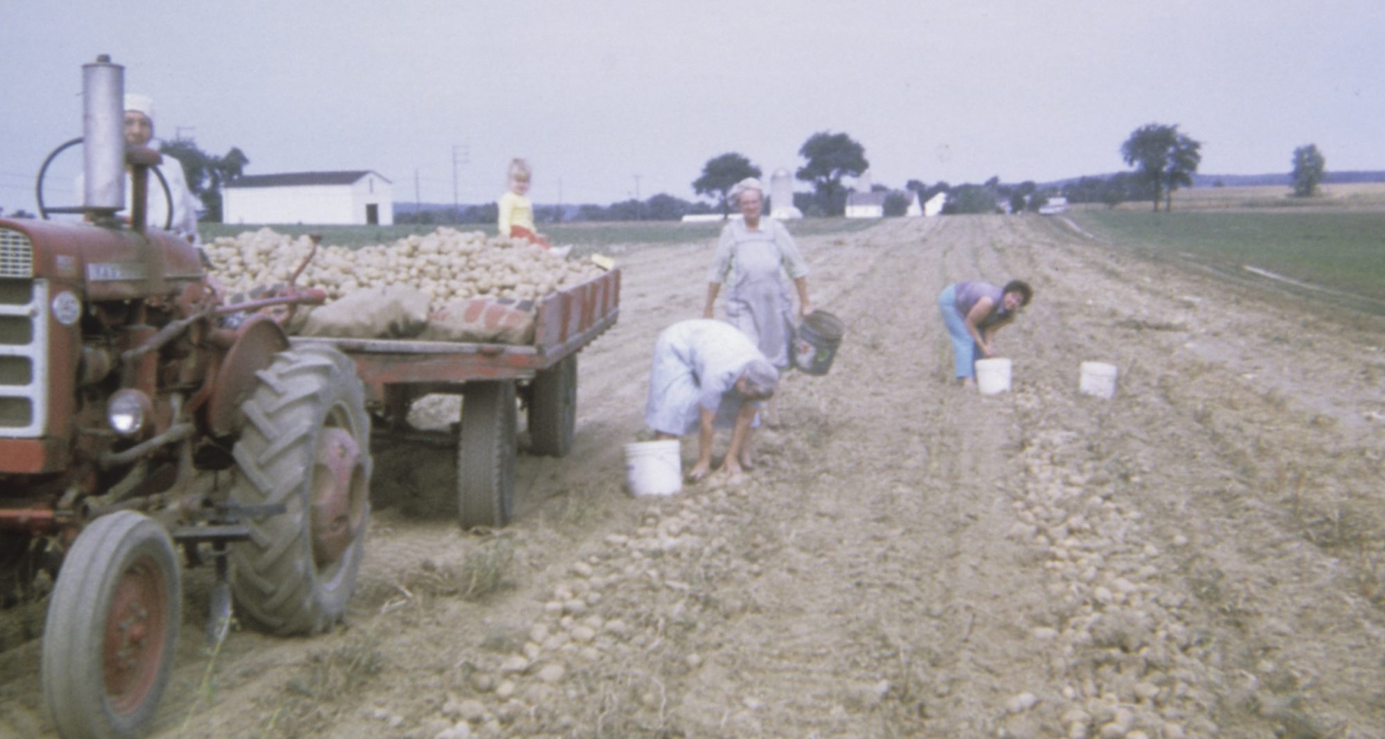 Edna Hoffer and Esther Henry work Hoffer Farm