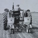 History of Hoffer Farm - Edna Hoffer on a planting tractor